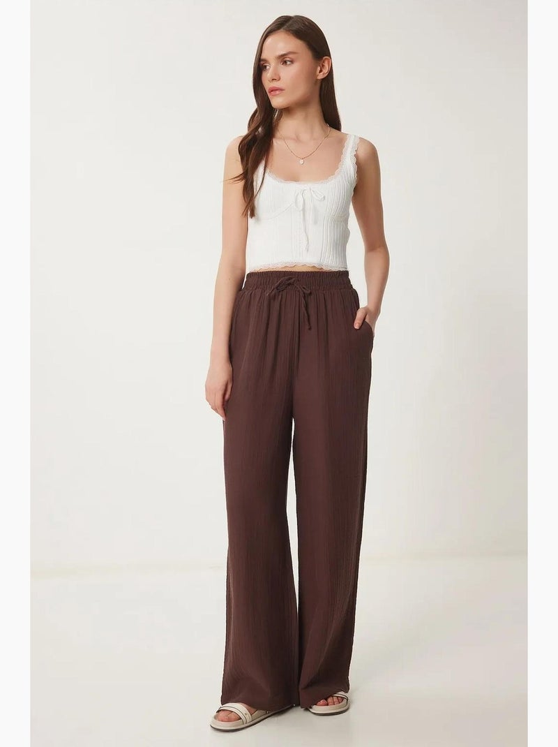 Wijde broek met trekkoord in de taille en biesdetail istanbul Bruin - Kiabi