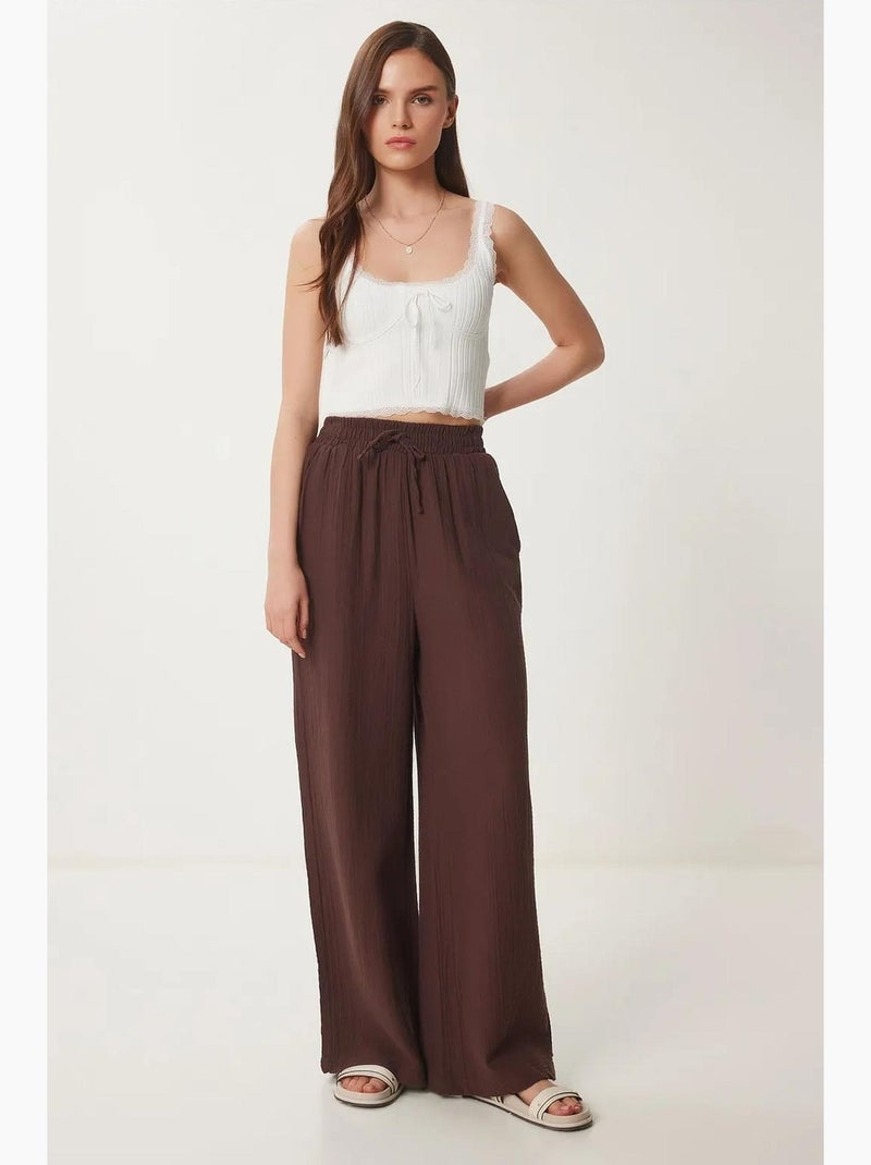 Wijde broek met trekkoord in de taille en biesdetail istanbul Bruin - Kiabi