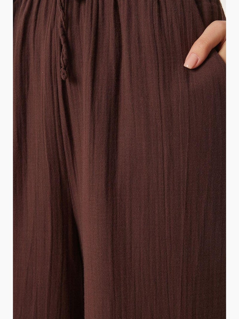Wijde broek met trekkoord in de taille en biesdetail istanbul Bruin - Kiabi