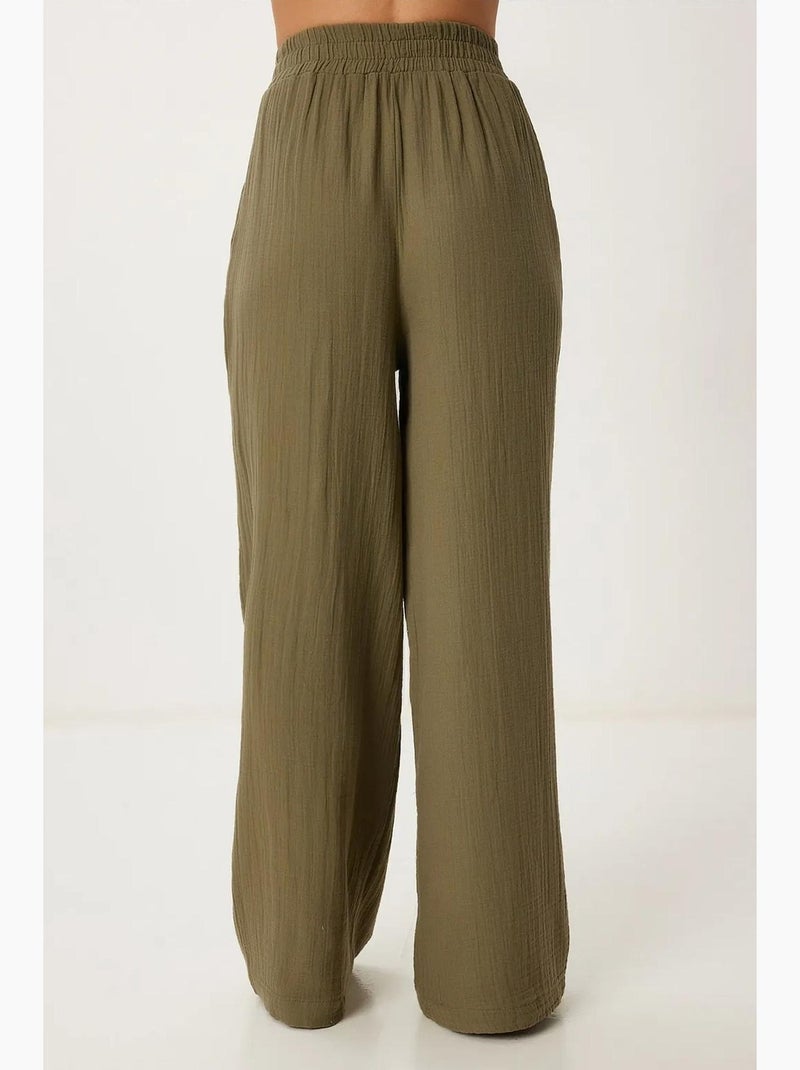 Wijde broek met trekkoord in de taille en biesdetail istanbul Kakigroen - Kiabi