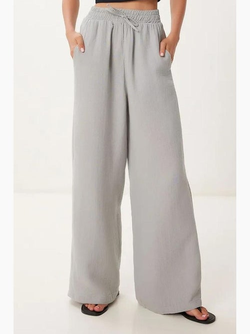 Wijde broek met trekkoord in de taille en biesdetail istanbul - Kiabi Wijde broek met trekkoord in de taille en biesdetail istanbul - Kiabi
