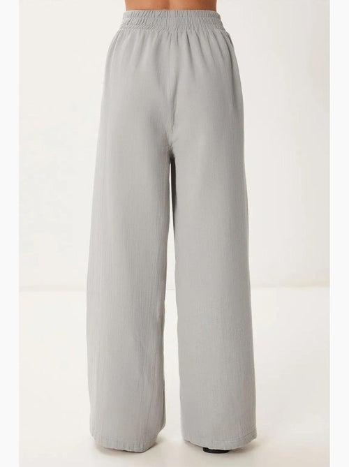 Wijde broek met trekkoord in de taille en biesdetail istanbul - Kiabi Wijde broek met trekkoord in de taille en biesdetail istanbul - Kiabi