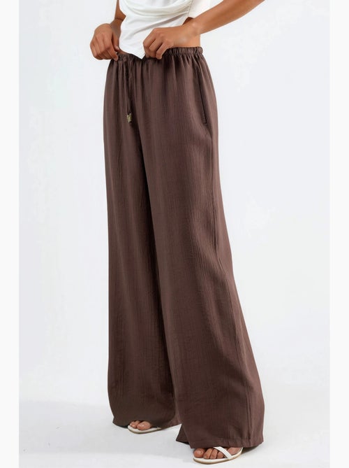 Wijde broek met trekkoord in de taille en zakken busem - Kiabi