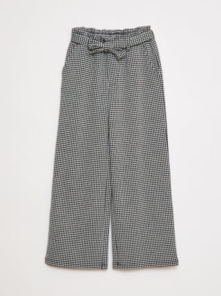 Wijde broek van milanotricot met knoopceintuur
