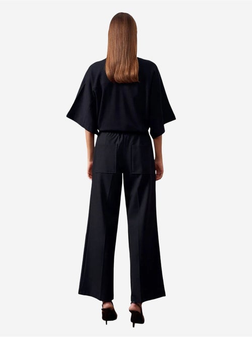 Wijde crêpe broek met ceintuur dilvin - Kiabi Wijde crêpe broek met ceintuur dilvin - Kiabi
