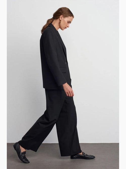 Wijde crêpe broek met trekkoord in de taille dilvin - Kiabi Wijde crêpe broek met trekkoord in de taille dilvin - Kiabi