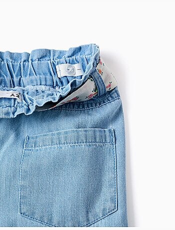 Wijde denim broek met bloemenriem