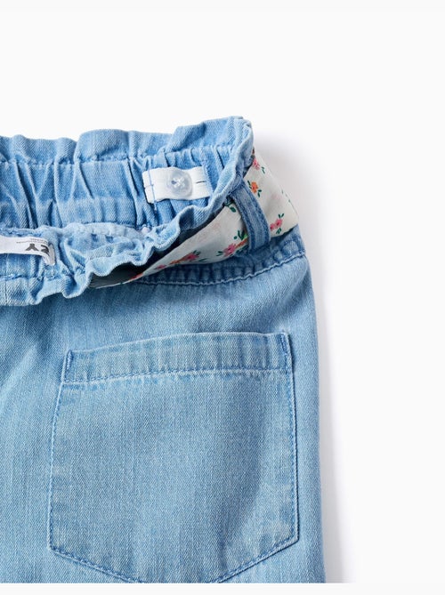 Wijde denim broek met bloemenriem - Kiabi Wijde denim broek met bloemenriem - Kiabi