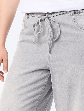 Wijde denim broek met strikceintuur