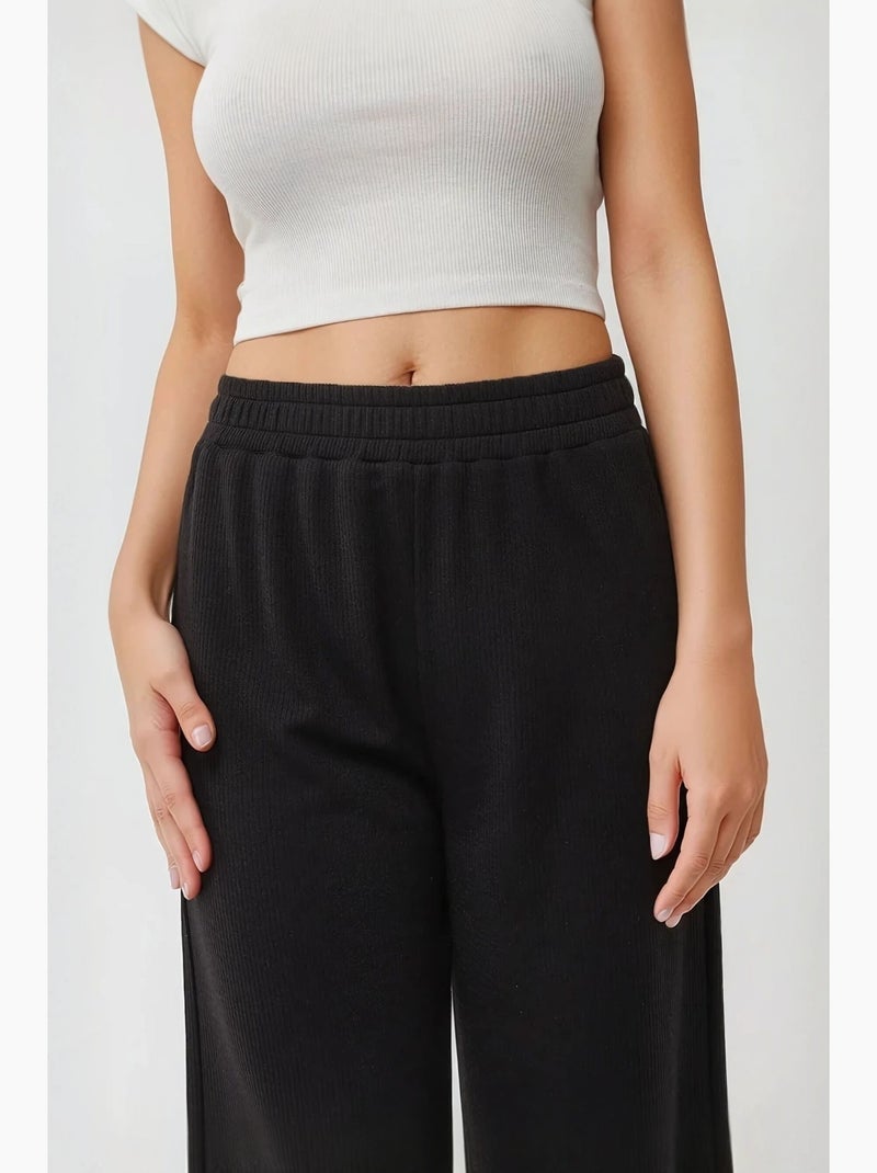 Wijde gebreide broek met elastische taille hiccup Zwart - Kiabi