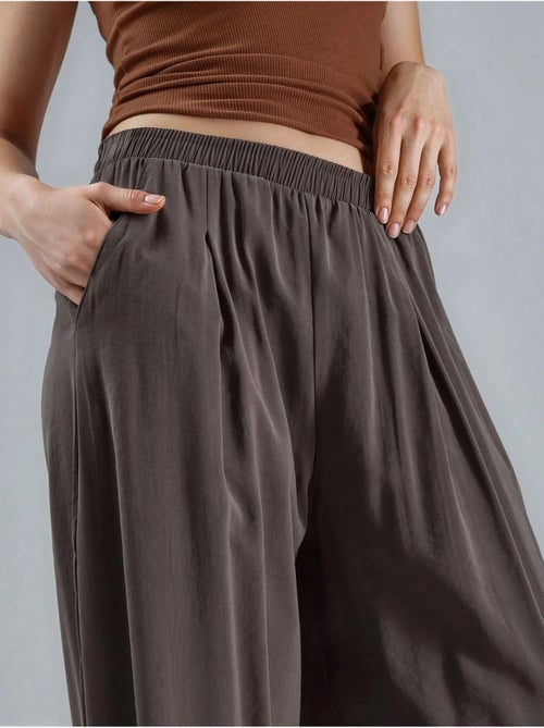 Wijde geplooide broek busem - Kiabi Wijde geplooide broek busem - Kiabi