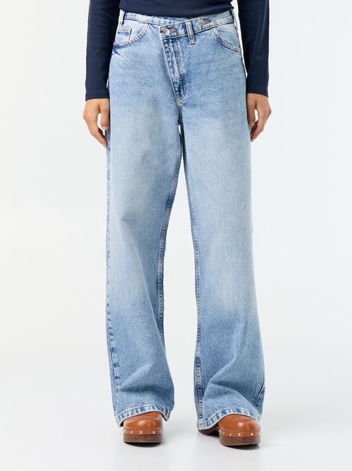Wijde jeans met asymmetrische knoopsluiting - Kiabi Wijde jeans met asymmetrische knoopsluiting - Kiabi
