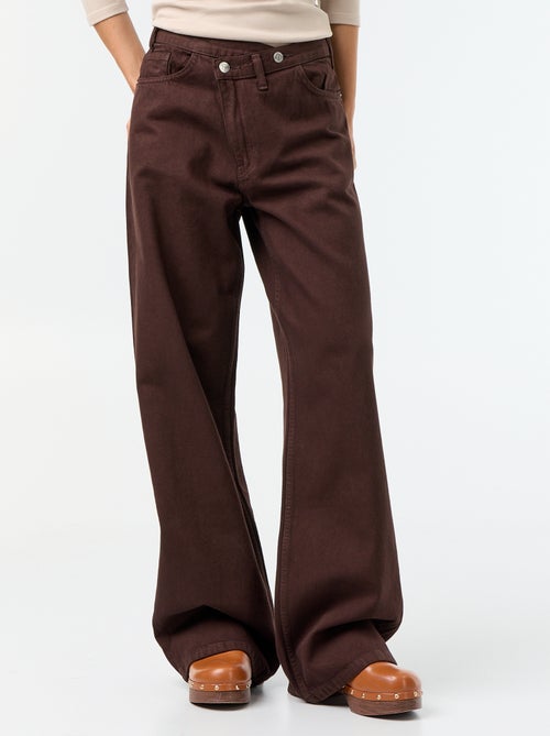 Wijde jeans met asymmetrische knoopsluiting - Kiabi Wijde jeans met asymmetrische knoopsluiting - Kiabi