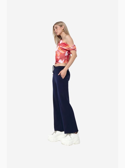 Wijde joggingbroek met elastische taille busem - Kiabi Wijde joggingbroek met elastische taille busem - Kiabi