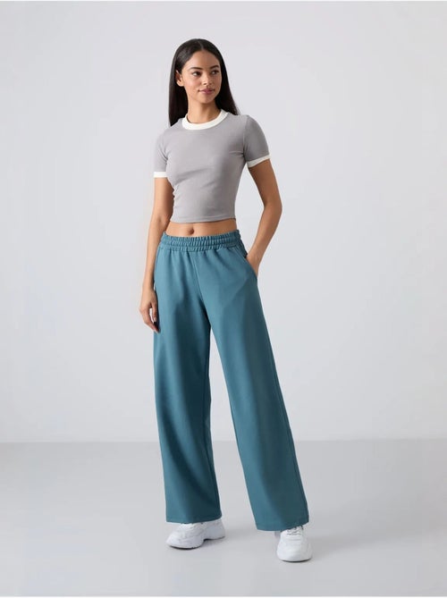 Wijde joggingbroek met hoge taille tommy - Kiabi Wijde joggingbroek met hoge taille tommy - Kiabi