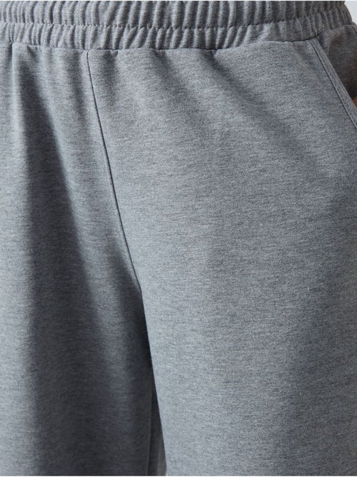 Wijde joggingbroek met hoge taille tommy - Kiabi Wijde joggingbroek met hoge taille tommy - Kiabi