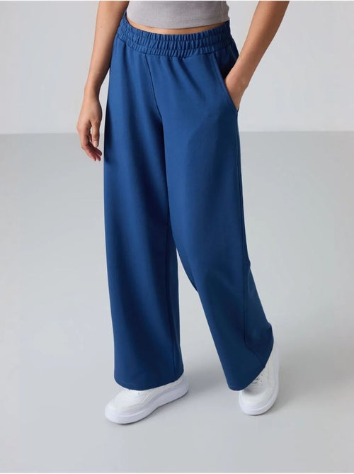 Wijde joggingbroek met hoge taille tommy - Kiabi Wijde joggingbroek met hoge taille tommy - Kiabi