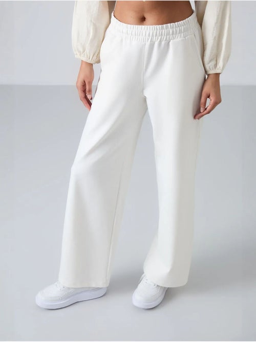 Wijde joggingbroek met hoge taille tommy - Kiabi Wijde joggingbroek met hoge taille tommy - Kiabi