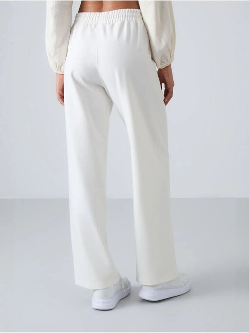 Wijde joggingbroek met hoge taille tommy - Kiabi Wijde joggingbroek met hoge taille tommy - Kiabi