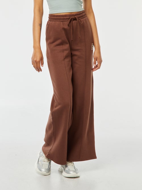 Wijde joggingbroek met sportswear-print - Kiabi