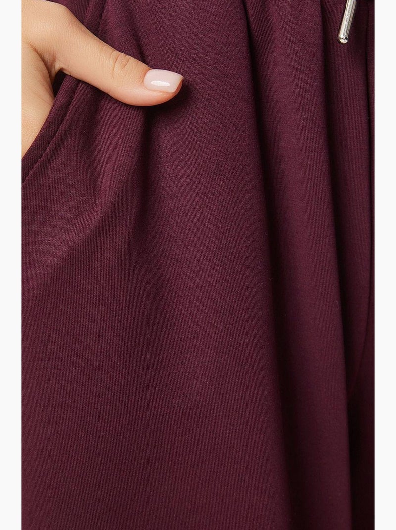 Wijde joggingbroek met trekkoordtaille istanbul Granaatrood - Kiabi