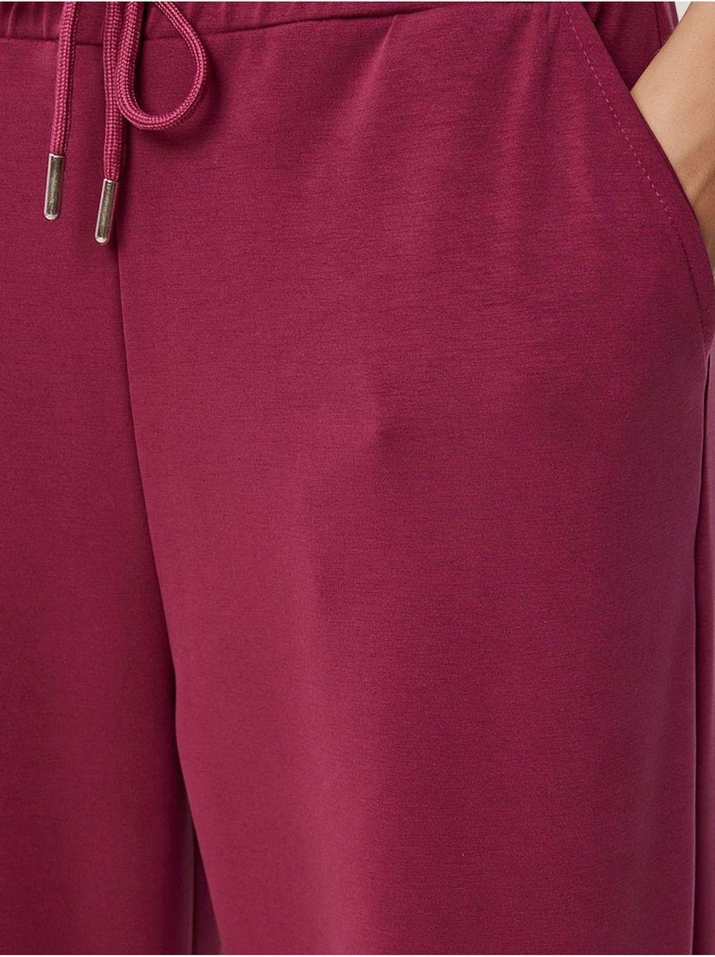 Wijde joggingbroek met trekkoordtaille istanbul Magenta - Kiabi