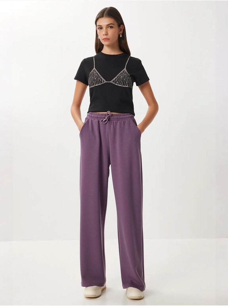 Wijde joggingbroek met trekkoordtaille istanbul Mauve - Kiabi