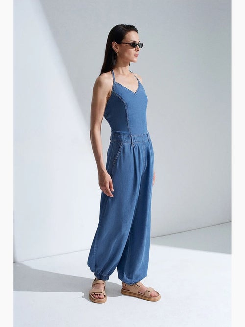 Wijde jumpsuit met halternek dilvin - Kiabi