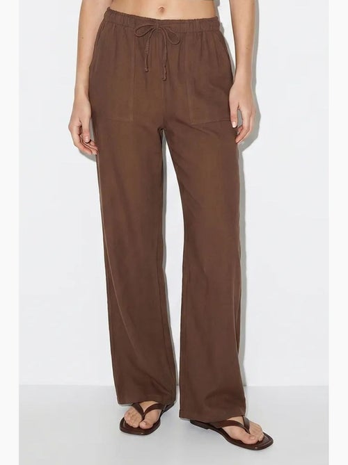 Wijde katoenen broek met trekkoord in de taille lucci - Kiabi Wijde katoenen broek met trekkoord in de taille lucci - Kiabi