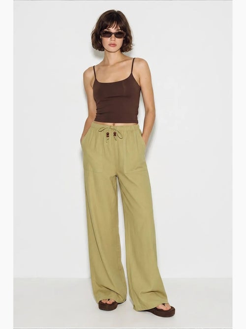 Wijde katoenen broek met trekkoord in de taille lucci - Kiabi Wijde katoenen broek met trekkoord in de taille lucci - Kiabi