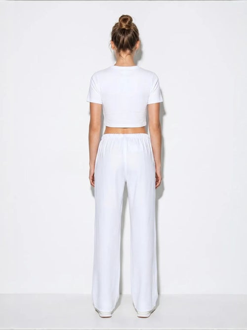 Wijde lyocell broek lucci - Kiabi Wijde lyocell broek lucci - Kiabi