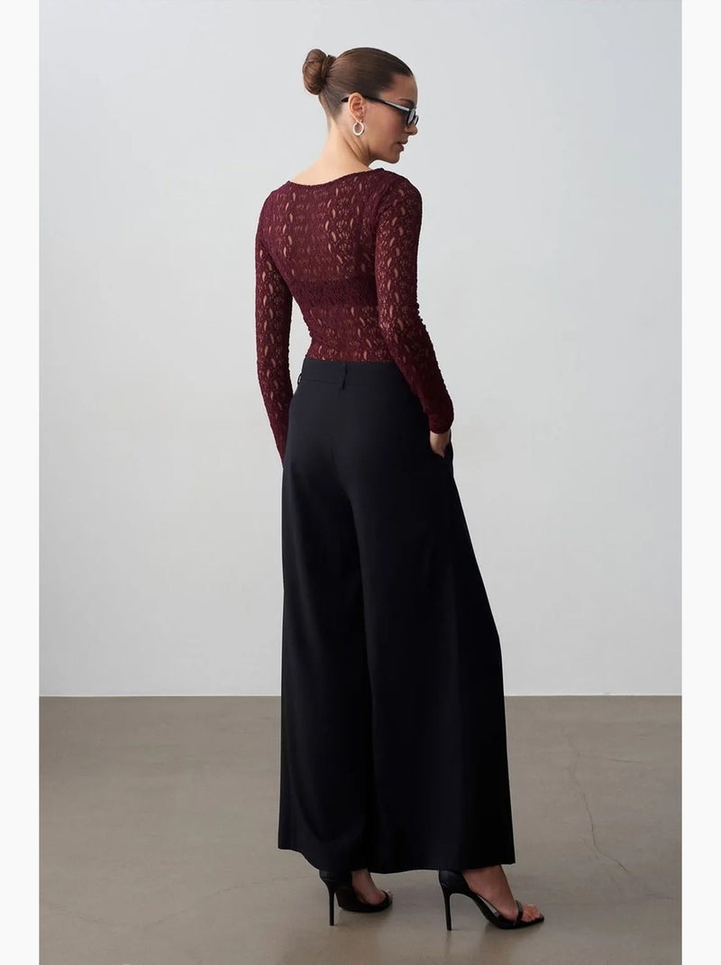 Wijde pantalon met plooien en ceintuur dilvin Zwart - Kiabi