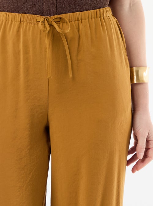 Wijde pantalon van soepelvallende stof - Kiabi