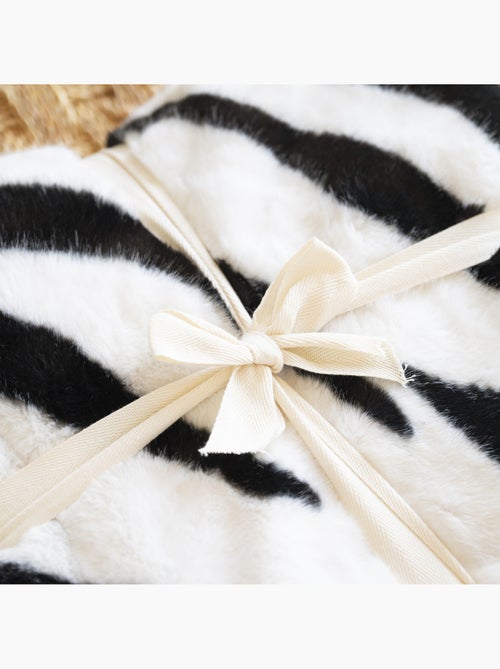 Zachte plaid met zebraprint en een achterkant van fluweel - Kiabi Zachte plaid met zebraprint en een achterkant van fluweel - Kiabi