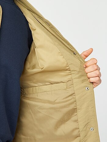 Doorgestikt donsjack met afneembare mouwen