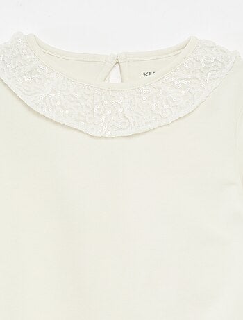 Effen T-shirt met lovertjes en ruches langs de hals