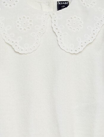 Gebreide trui met geborduurde kraag