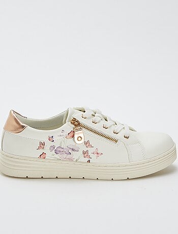 Lage sneakers met bloemen- en vlinderprint