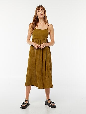 Lange jurk met bandjes en blote rug