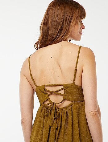 Lange jurk met bandjes en blote rug