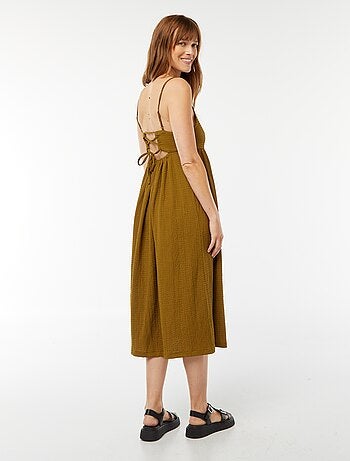 Lange jurk met bandjes en blote rug