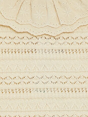 Mouwloos truitje met ajourmotiefje