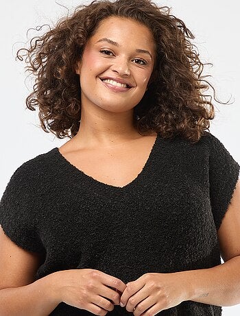 Mouwloos truitje van fijngebreid tricot