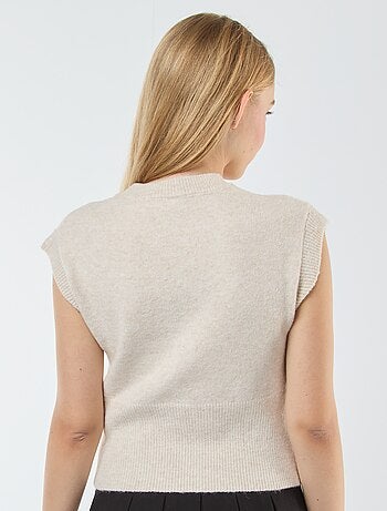 Mouwloos truitje van warm tricot