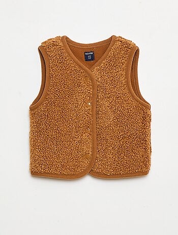 Mouwloos vest met imitatieschapenvacht