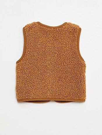 Mouwloos vest met imitatieschapenvacht