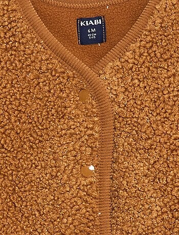 Mouwloos vest met imitatieschapenvacht