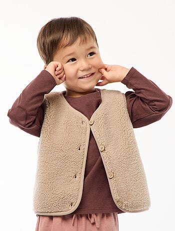Mouwloos vest van imitatieschapenvacht