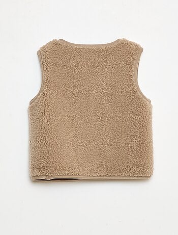 Mouwloos vest van imitatieschapenvacht