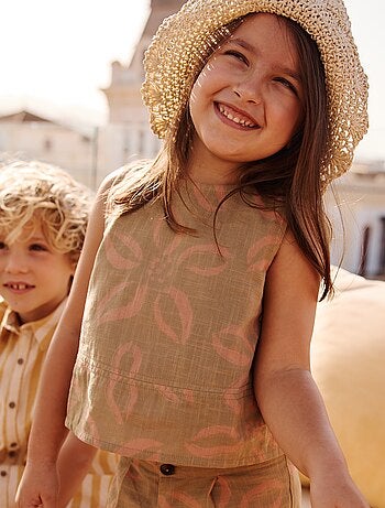 Mouwloze top met strikjes